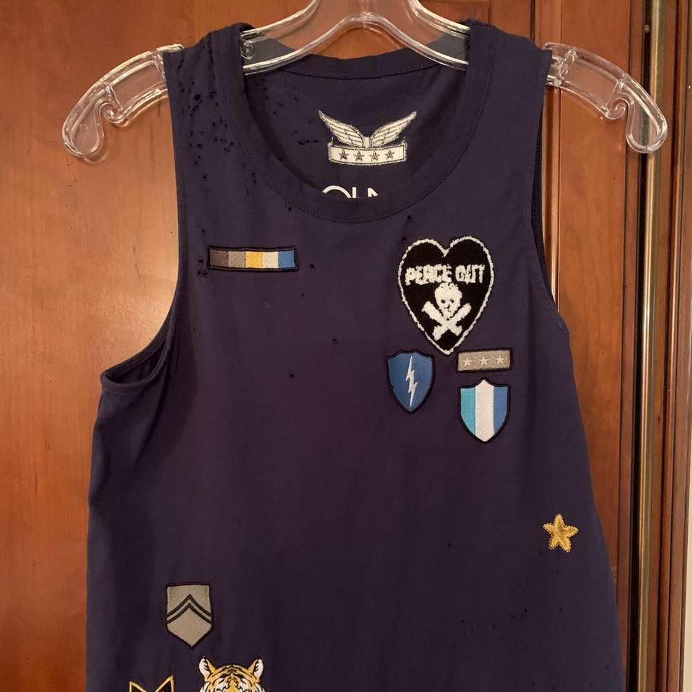 Adorable distressed patched tank top!